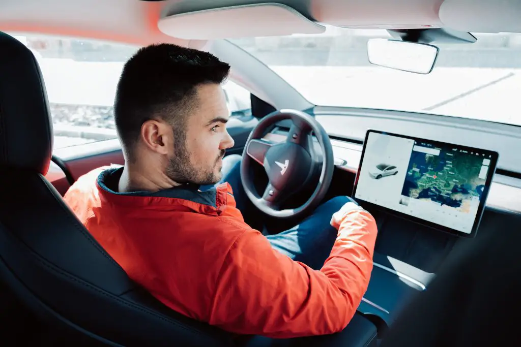 Can you watch Netflix while driving Tesla?