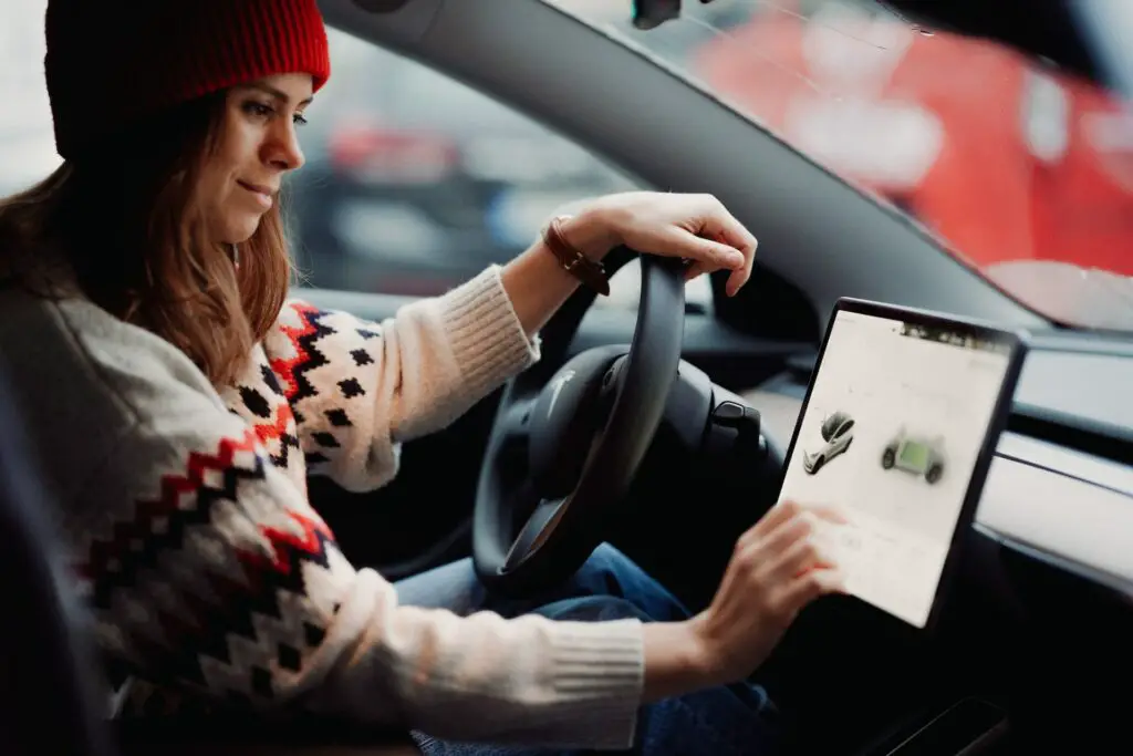 Reset Tesla screen while driving
