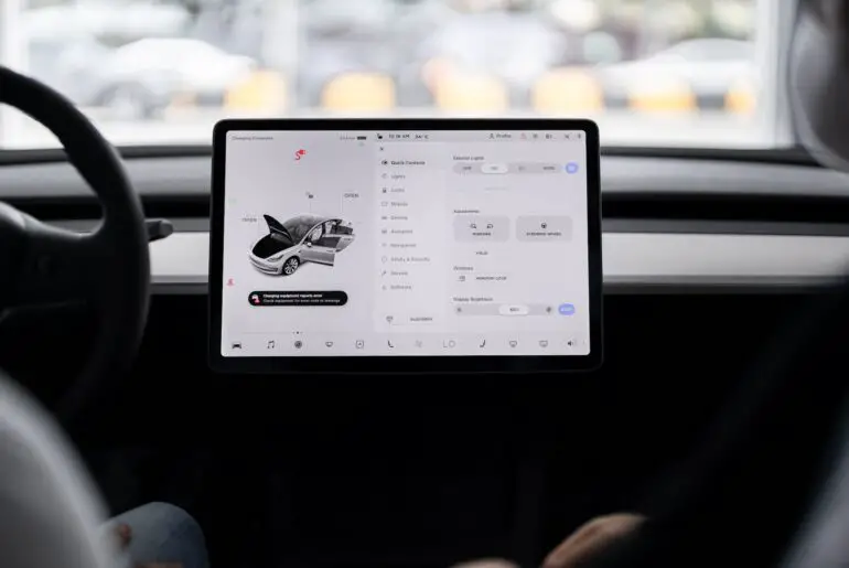 Reset Tesla screen while driving